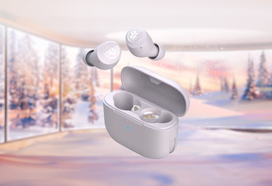 JLab GO Air Pop white earbuds with a snowy landscape backdrop