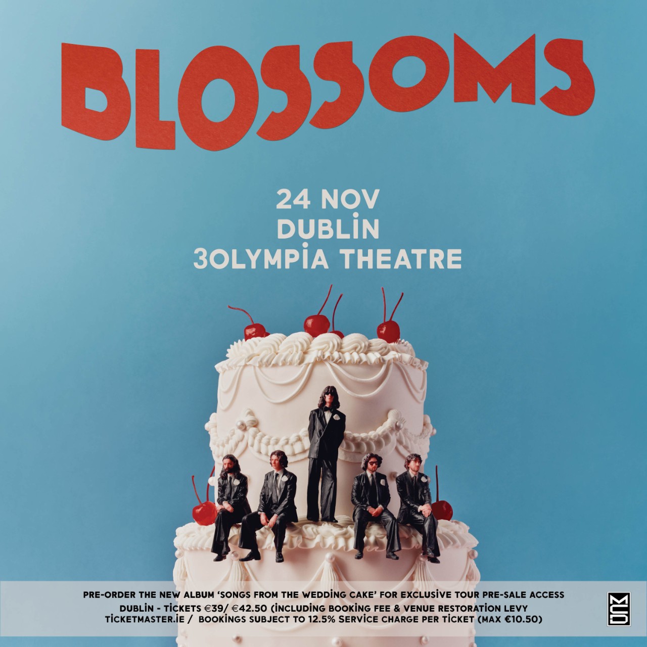 Blossoms promotional poster for a Dublin 3Olympia Theatre concert on 24 November, featuring the band seated around a large wedding cake.