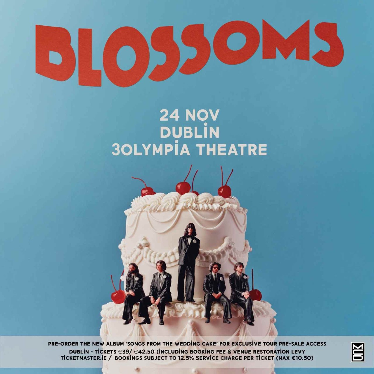 Blossoms promotional poster for a Dublin 3Olympia Theatre concert on 24 November, featuring the band seated around a large wedding cake.