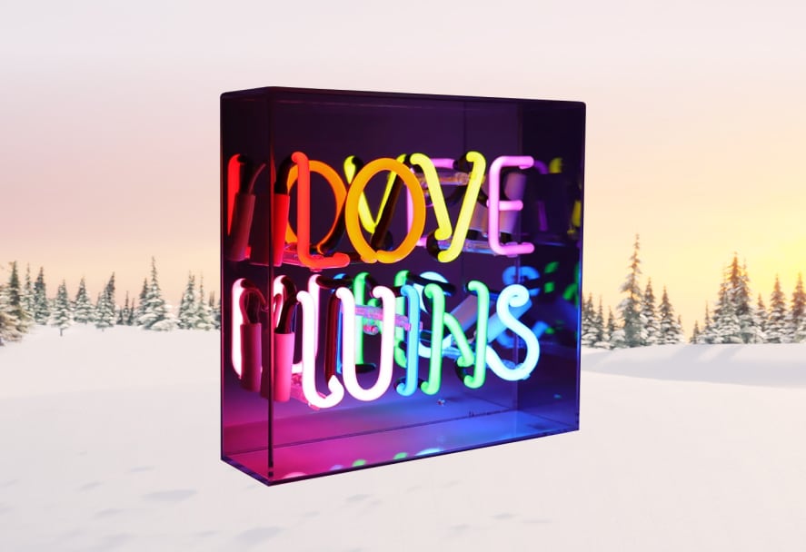 Locomocean Love Neon Sign on a snowy mountain backdrop