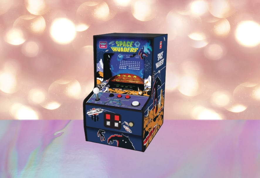 Mini space invaders retro game on a sparkle backdrop