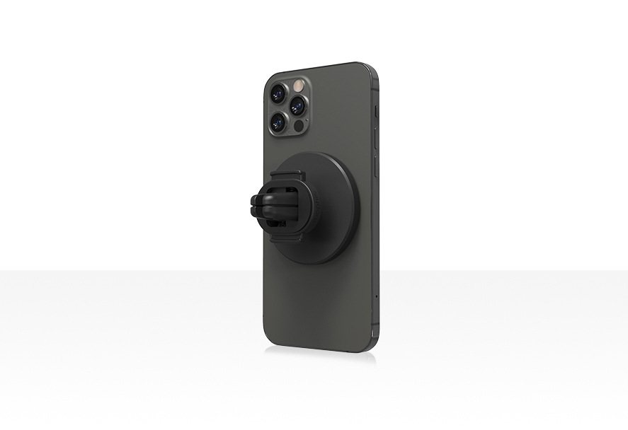 A black iPhone 12 Pro with a black Mophie Snap Vent Mount attached to its back, viewed at an angle. A black iPhone 12 Pro with a black Mophie Snap Vent Mount attached to its back, viewed at an angle.