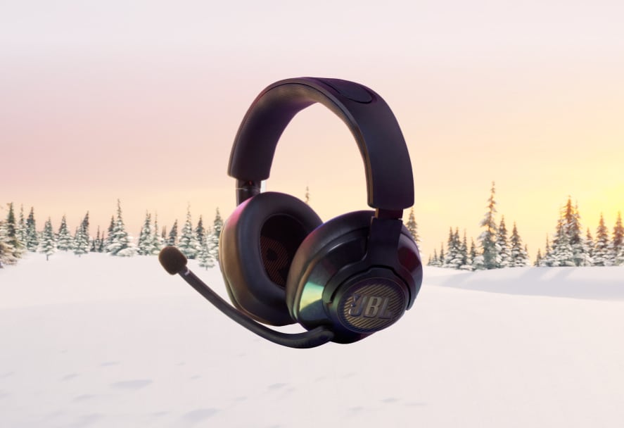 JBL Quantum 400 RGB Headphones on a snowy mountain backdrop