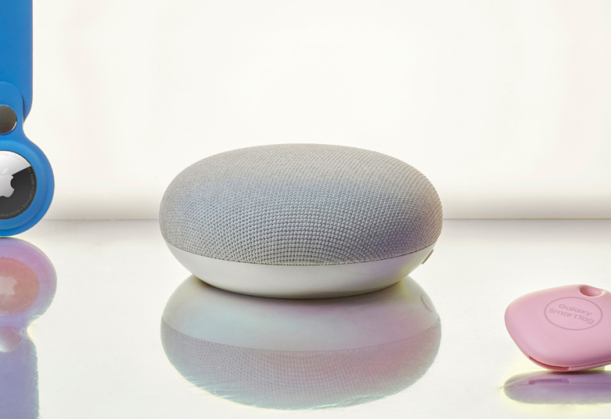 A grey Google Nest mini