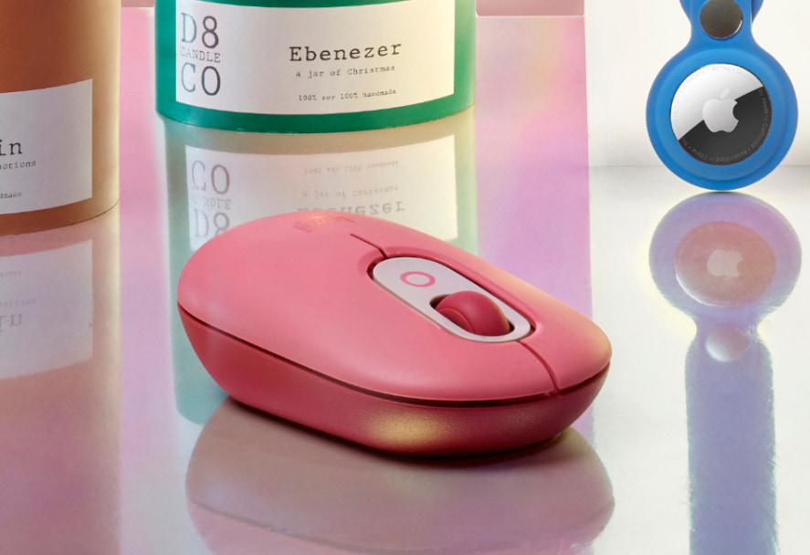 A pink Logitech Pop computer mouse 