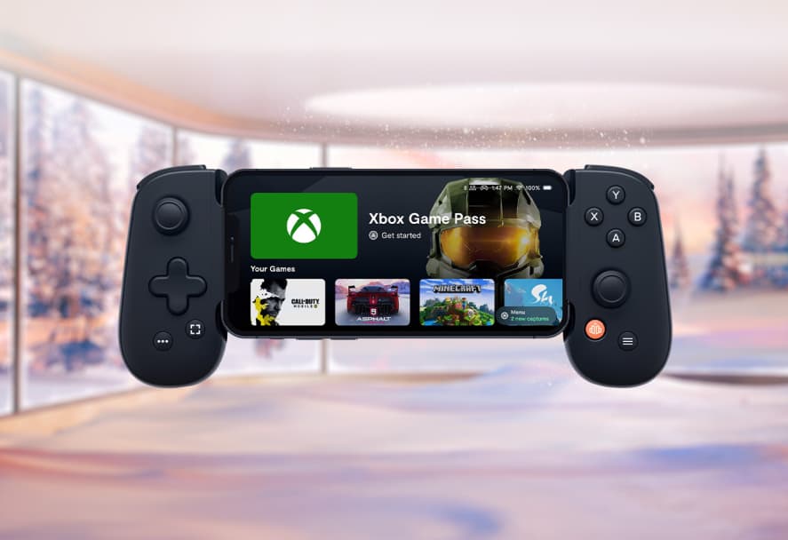 A black backbone one game controller on a festive backdrop