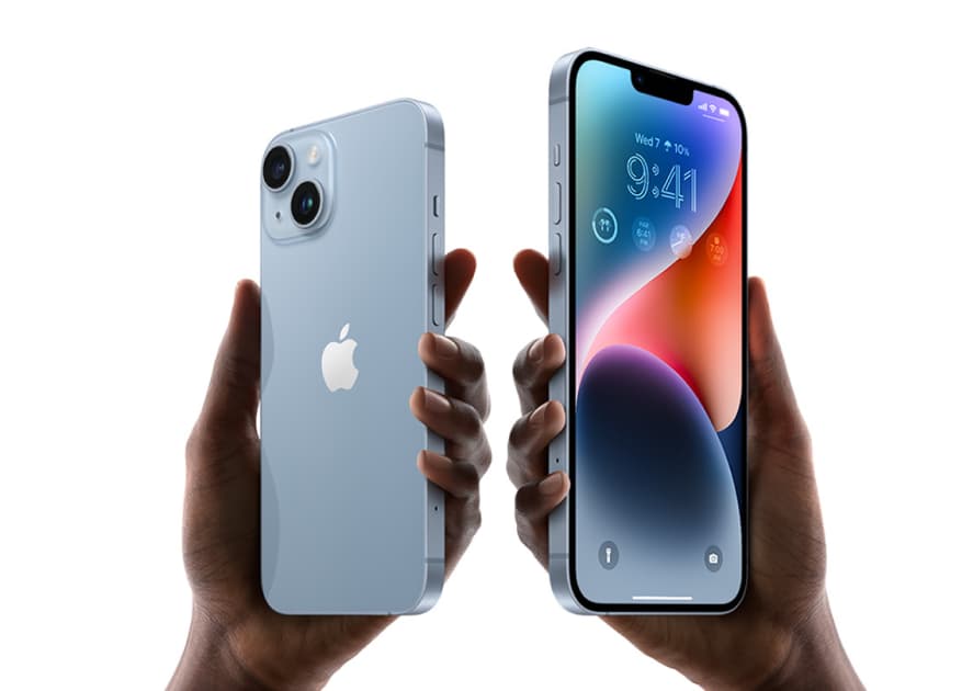 Two hands are holding two light blue iPhones, one facing backward to show the camera lenses and Apple logo, and the other facing forward displaying the screen with the time. Two hands are holding two light blue iPhones, one facing backward to show the camera lenses and Apple logo, and the other facing forward displaying the screen with the time.