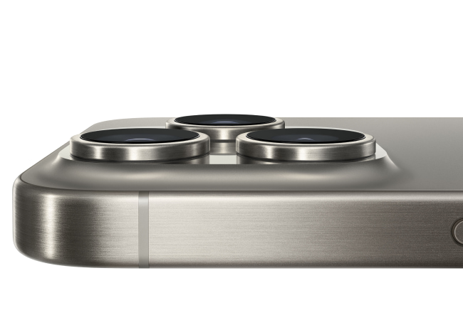A close-up side view of a metallic smartphone, showcasing its three prominent camera lenses. A close-up side view of a metallic smartphone, showcasing its three prominent camera lenses.