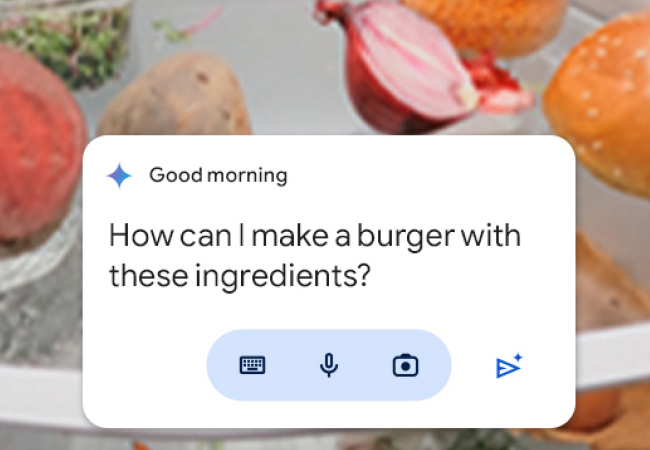 A digital assistant interface, overlaying a blurry image of food ingredients, asks "How can I make a burger with these ingredients?" A digital assistant interface, overlaying a blurry image of food ingredients, asks "How can I make a burger with these ingredients?"