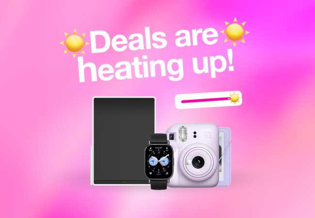 A promotional banner on a pink gradient background with the text "Deals are heating up!" between two sun icons. Below a small slider graphic, a black tablet with a stylus, a black smartwatch, and a light purple Fujifilm Instax instant camera are displayed