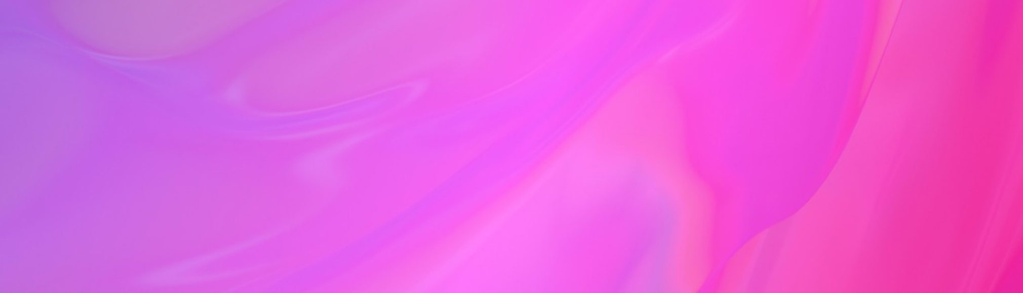 Abstract pink and purple gradient background with soft flowing shapes.