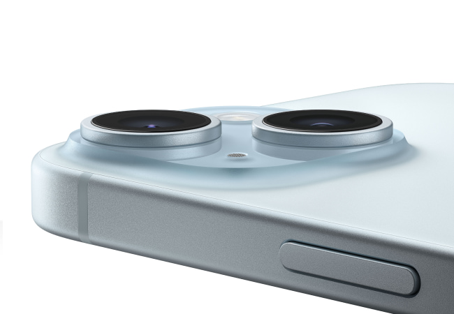 A close-up of a light blue smartphone's camera bump reveals two large lenses and a flash.