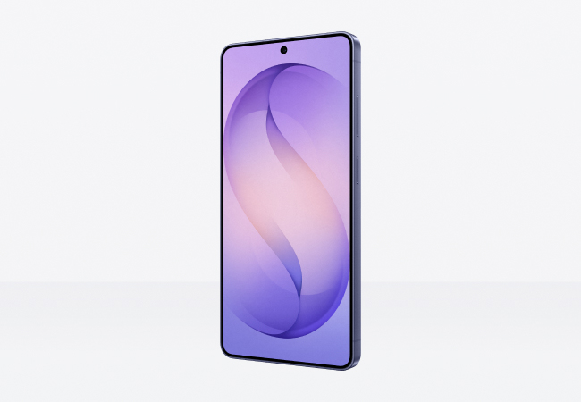 A side-angled view of a Samsung Galaxy S26 leaning on a reflective white surface. The screen displays a vibrant, flowing purple and lavender abstract 'S' curve wallpaper.