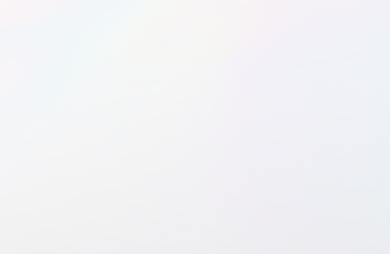 A solid, light off-white background with subtle variations in tone, resembling a blank sheet of paper.