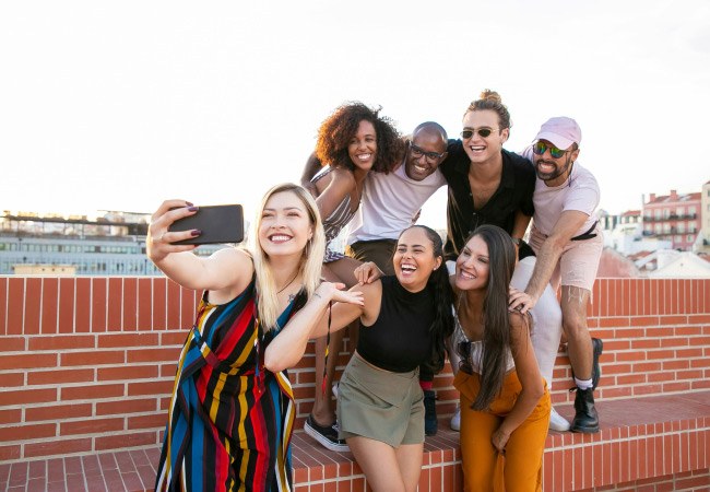 Group of people taking a selfie