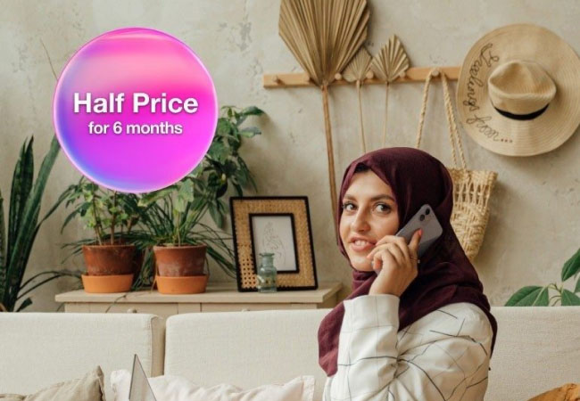 A woman enjoying her half price Sim only plan for 6 months.